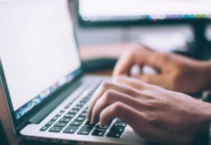 Man in front of the laptop